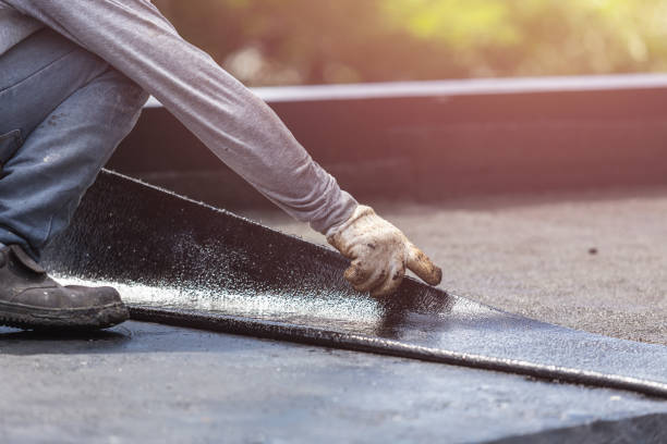 Professional Basement Waterproofing technician working in Sumner, IL